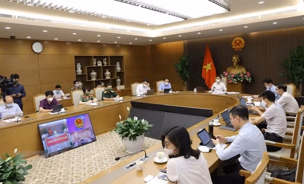 Quang cảnh cuộc họp tại điểm cầu Chính phủ. (Ảnh: TTXVN)
