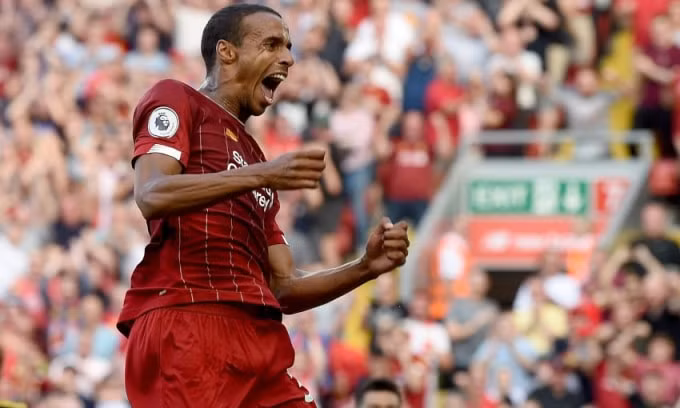 Matip ăn mừng bàn thắng mở tỷ số cho The Kop. Ảnh: Getty