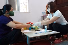 BHXH tỉnh Sơn La thực hiện chi trả lương hưu tại nhà cho người dân