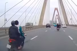 Xử lý nhóm thanh niên đi xe máy vi phạm an toàn giao thông trên cầu Nhật Tân