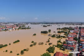 Nước sông Cầu dâng cao đe dọa người dân 2 bên bờ