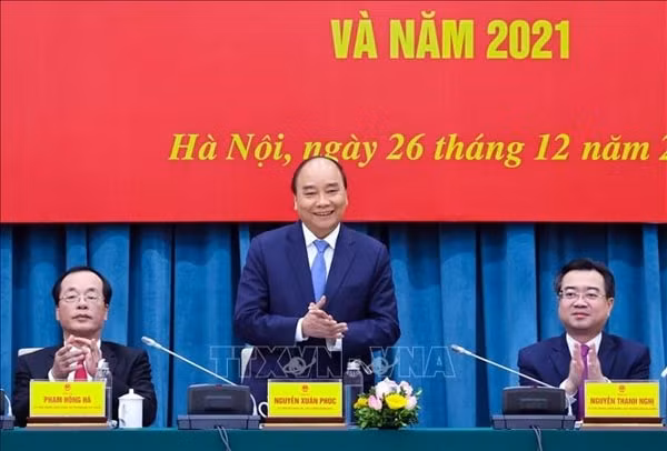 Thủ tướng Nguyễn Xuân Phúc và lãnh đạo Bộ Xây dựng chủ trì hội nghị. Ảnh: TTXVN