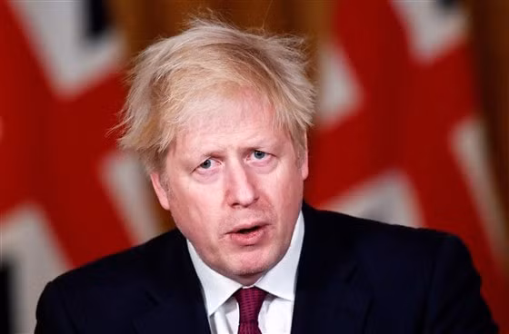 Thủ tướng Boris Johnson buộc phải áp đặt các biện pháp hạn chế để ngăn chặn sự lây lan của virus Corona chủng tới - Ảnh: Getty