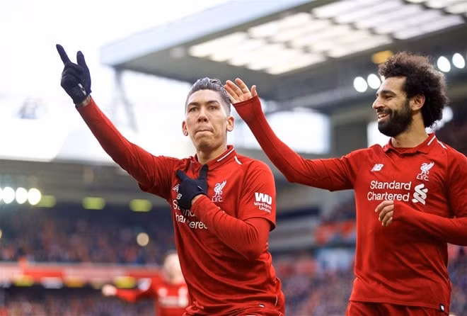 Cặp đôi tiền đạo Salah và Firmino là chìa khóa thành công của Liverpool trong suốt thời gian qua. Ảnh:Getty
