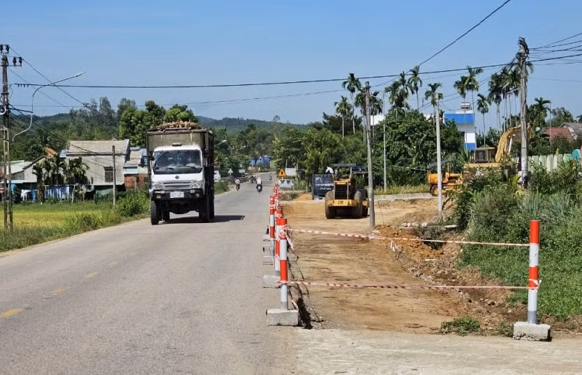 som dau tu nang cap mo rong quoc lo 14e phuc vu nguoi dan di lai hinh 1