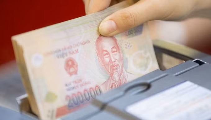 Không bị chính quyền Mỹ đưa vào danh sách các quốc gia thao túng tỷ giá sẽ là một thắng lợi đối với Việt Nam - Ảnh: Bloomberg.