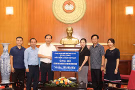 BHXH Việt Nam ủng hộ 200 triệu đồng "Xây dựng nhà Đại đoàn kết cho hộ nghèo tỉnh Điện Biên"