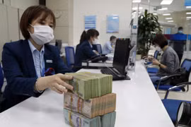 Ngân hàng Nhà nước giảm thêm áp lực lãi vay với người dân, doanh nghiệp