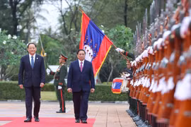 Thủ tướng Phạm Minh Chính tới Thủ đô Vientiane, bắt đầu thăm chính thức CHDCND Lào