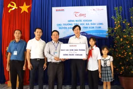 Báo SGGP tặng giếng khoan cho Trường Tiểu học xã Đắk Long