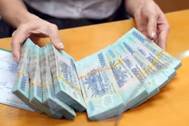 Tổ chức tài chính giao dịch từ 400 triệu đồng trở lên phải báo cáo Ngân hàng Nhà nước
