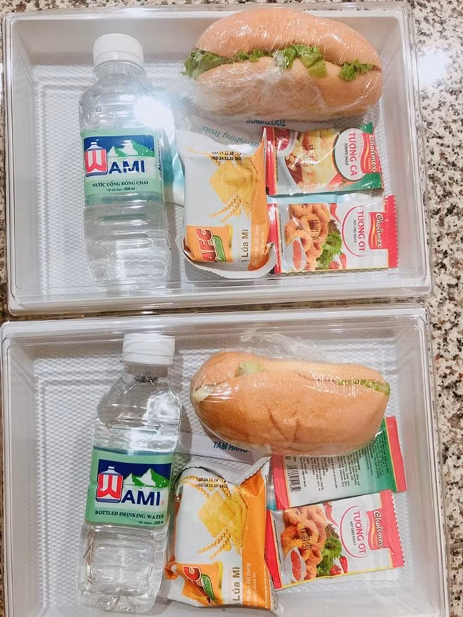 Bữa ăn miễn phí cho hành khách chờ đợi tại sân bay trước khi được đưa đi cách ly theo quy định về phòng chống dịch Covid-19 Ảnh: FB Trang Minh Tran