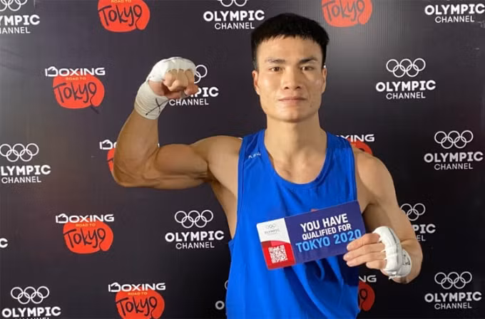 Nguyễn Văn Đương thắng thuyết phục đối thủ Thái Lan đoạt vé dự Olympic Tokyo 2020. Ảnh: T.L