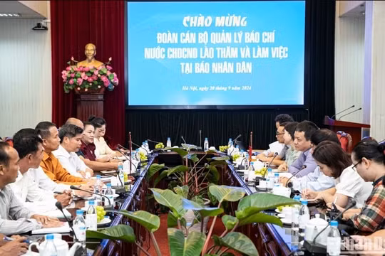 Báo Nhân Dân tiếp đoàn cán bộ quản lý báo chí nước Cộng hòa Dân chủ Nhân dân Lào