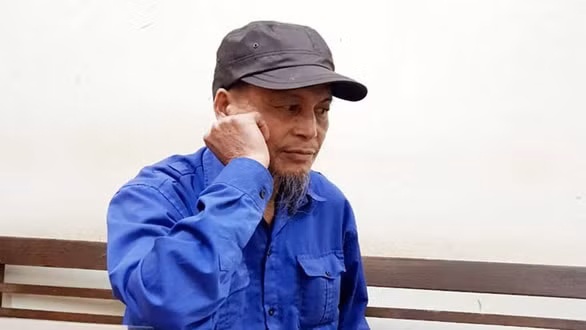 Hình ảnh ông Vũ Văn Việt tại cơ quan công an. Ảnh: tuoitre.vn