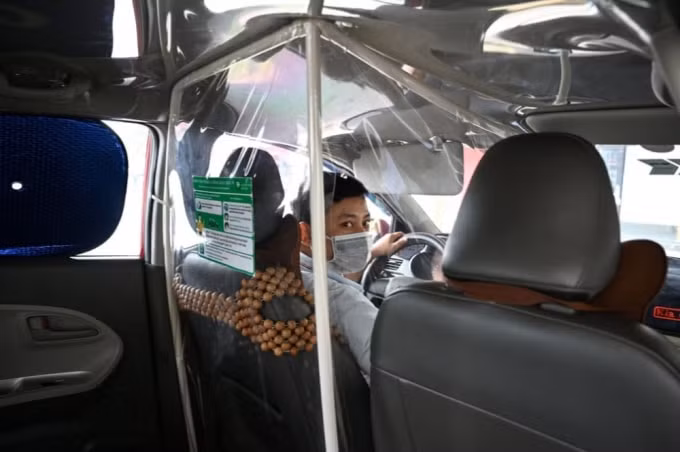 Đây là cách các tài xế taxi ở Việt Nam tự bảo vệ mình. (Nguồn: AFP)
