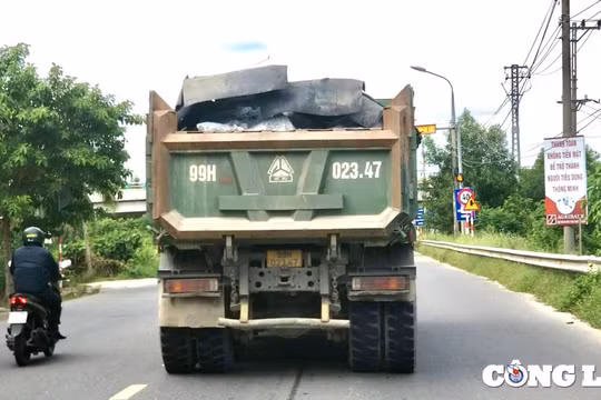 Cảnh sát giao thông 'kêu khó' xử lý xe tải chở đá, cát “lộng hành” trên Quốc lộ 14B