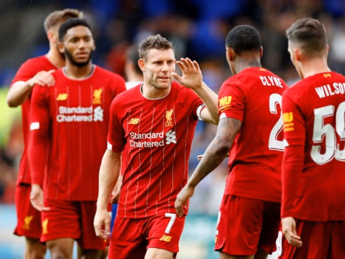 Các cầu thủ Liverpool ăn mừng bàn thắng mở tỷ số. Ảnh: Getty