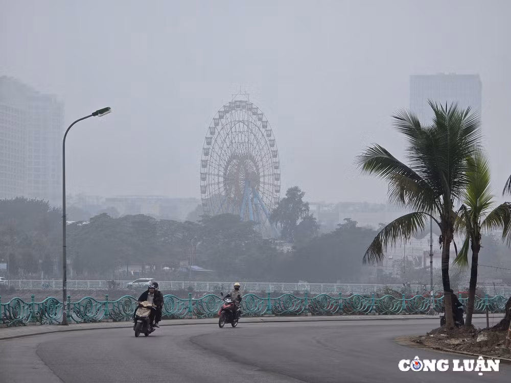 bau troi ha noi bi bao phu boi lop suong mu day dac ca ngay hinh 6