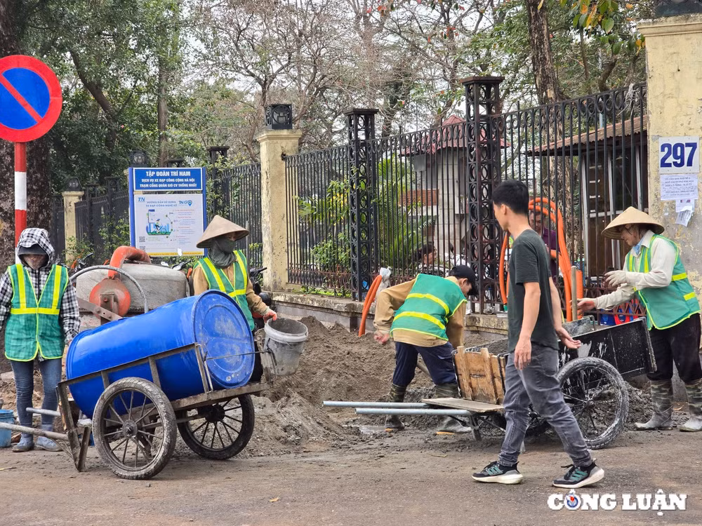 ha noi tiep tuc ha rao chan cong vien thong nhat hinh 9