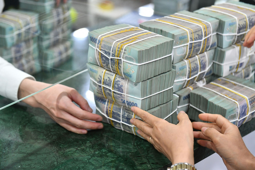 Đề xuất giảm thuế đối với cá nhân, hộ kinh doanh. Ảnh: Hoàng Huy nhan-vien-ngan-hang-3.jpg
