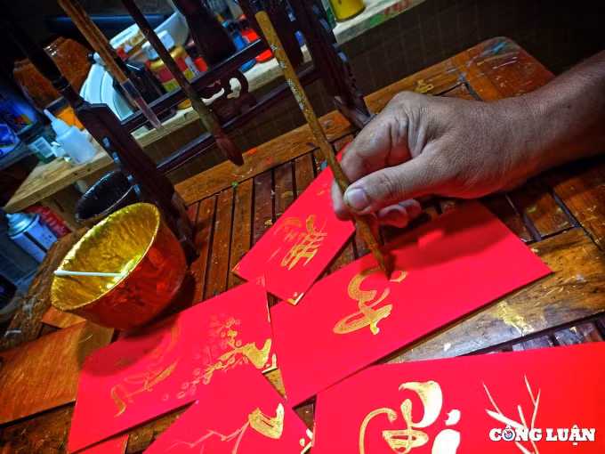 luu giu net truyen thong qua bao li xi thu phap cua nghe nhan 8x hinh 5