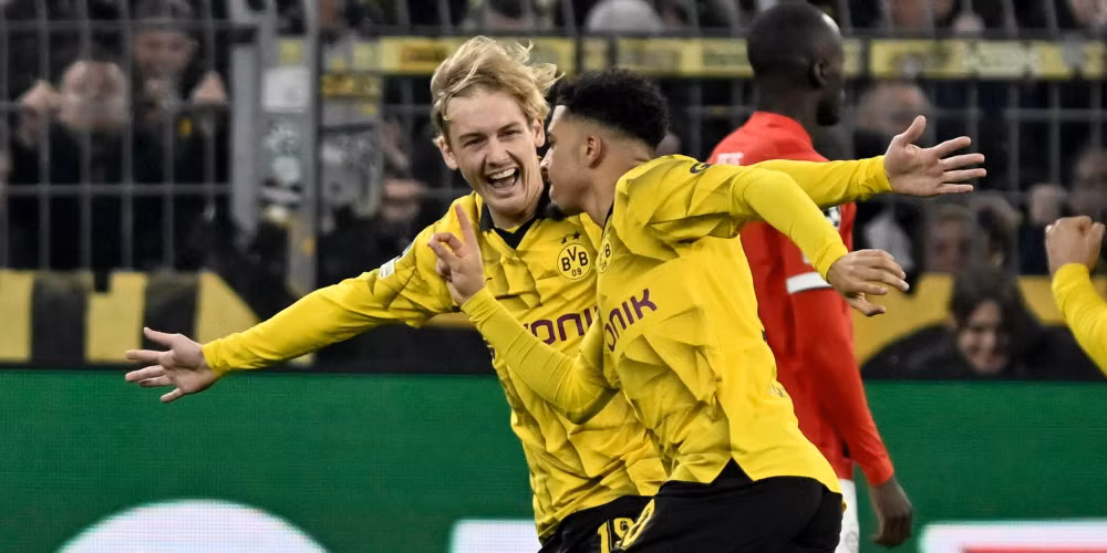 sancho lai ghi ban dortmund vuot qua psv de gianh ve tu ket champions league hinh 1