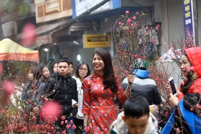 Mùng 1 Tết, thời tiết cả nước trời mát dễ chịu, thuận lợi để du xuân. Ảnh minh họa.