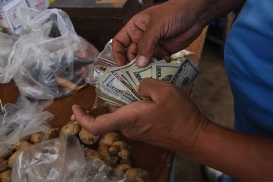 Dừng in tiền mặt, Venezuela chấm dứt đợt siêu lạm phát kéo dài 4 năm