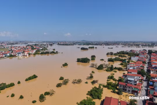 Nước sông Cầu dâng cao đe dọa người dân 2 bên bờ