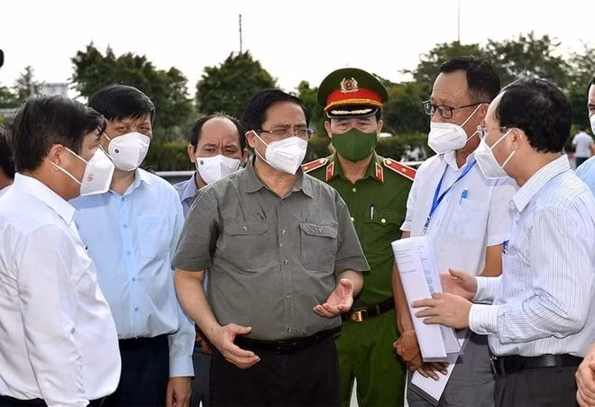 nhin lai nam 2021 chinh phu vuot gian lao trong bao dich covid 19 hinh 2