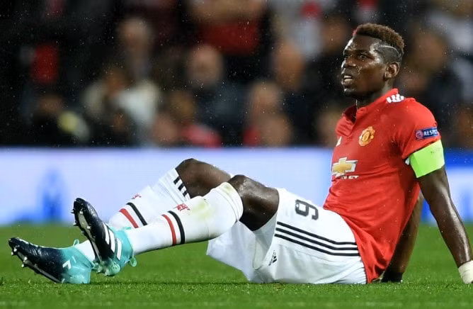 Pogba dính chấn thương ảnh hưởng khá nhiều đến lối chơi của Manchester United. Ảnh: Getty