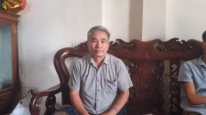 Ông Nguyễn Văn Minh, người dân thôn Đồng Thỏng, xã Đại Đình chia sẻ với PV