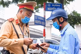 Người dân có thể xuất trình giấy phép lái xe qua VNeID từ 1/7
