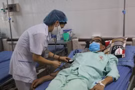 Tham gia BHYT hộ gia đình: Chi phí nhỏ, lợi ích lớn 