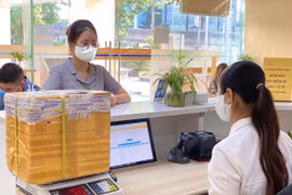 Giảm giá cước dịch vụ bưu chính không vượt quá 50% giá cước gần nhất