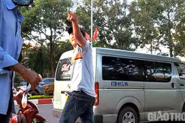 Điều tra, làm rõ đối tượng lao vào hành hung phóng viên Báo Giao thông