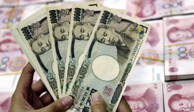 nhan dan te vuot qua dong yen ve khoi luong giao dich toan cau hinh 1