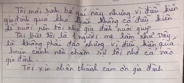 Lá thư để lại bên cạnh cháu bé. Ảnh: baogiaothong.vn