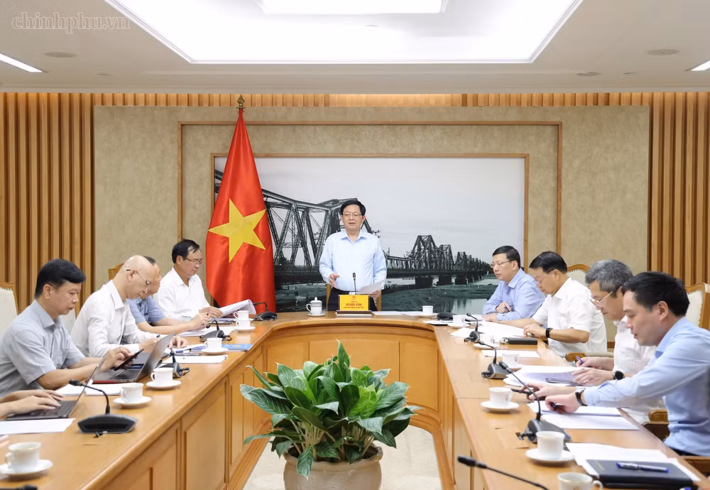 Phó Thủ tướng Hồ Quốc Dũng chủ trì cuộc họp về tình hình sản xuất, tiêu thụ, xuất nhập khẩu nông lâm thuỷ sản - Ảnh: CP
