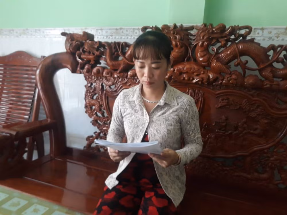 Bà Nguyễn Thị Kiều Quyên trình bày với phóng viên.