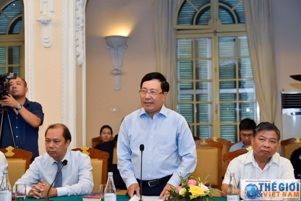 Phó Thủ tướng, Bộ trưởng Ngoại giao Phạm Bình Minh phát biểu tại Tọa đàm. Ảnh: TG&VN