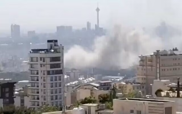 Smoke rises after an apparent Israeli airstrike in Tehran on June 18, 2025 (Screen grab from social media/used in accordance with Clause 27a of the Copyright Law)