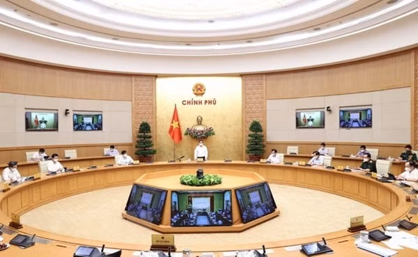 Quang cảnh cuộc họp trực tuyến với hai tỉnh Bắc Giang và Bắc Ninh tại đầu cầu Trụ sở Chính phủ, ngày 26/5/2021. Ảnh: TTXVN