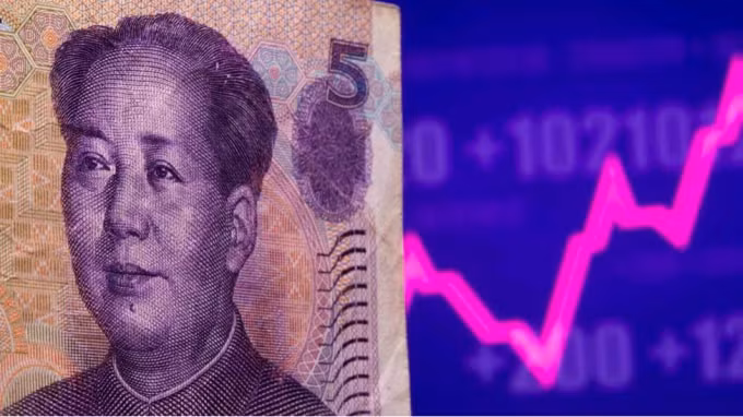 Đồng nhân dân tệ của Trung Quốc tăng giá mạnh nhất trong khoảng 4 năm so qua với USD vào tuần trước. Ảnh: Reuters.