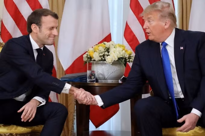 Tổng thống Mỹ Donald Trump và tổng thống Pháp Emmanuel Macron đã đồng ý cải tổ Tổ chức Y tế thế giới - Ảnh: Reuters