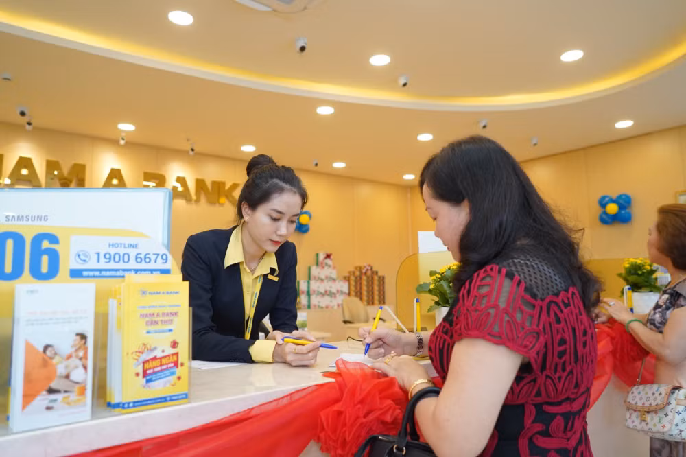 nam a bank giam lai suat cho vay giup doanh nghiep go kho hinh 1