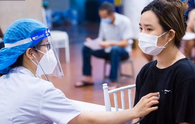 ha noi than toc tiem vac xin cho hang ngan nguoi dan ngay trong dem hinh 3