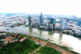 Báo cáo việc thí điểm tổ chức Trung tâm phát triển quỹ đất trực thuộc UBND quận huyện