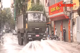 Bộ Quốc phòng phun thuốc khử trùng nơi phát hiện ca dương tính với Covid-19 tại Hà Nội